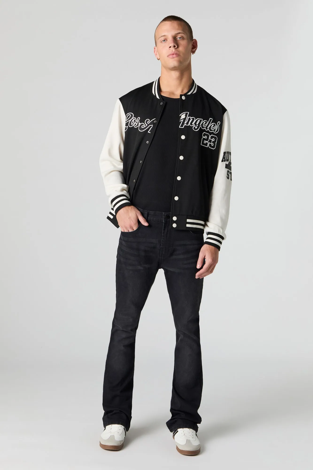 Blouson de style universitaire en molleton avec motif brodé