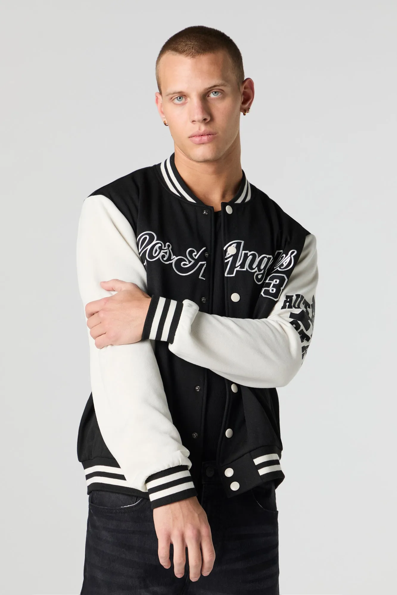 Blouson de style universitaire en molleton avec motif brodé