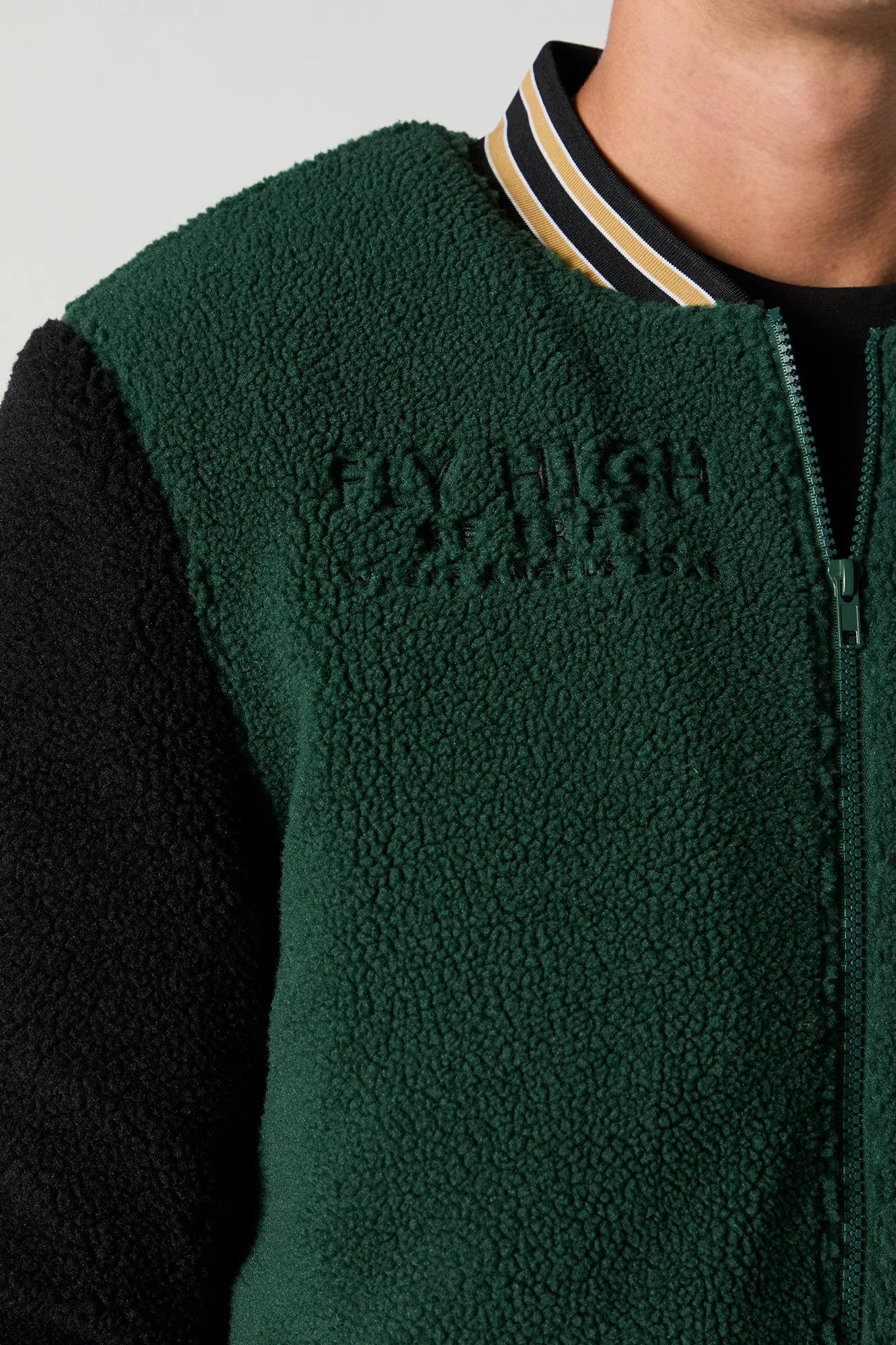 Blouson de style universitaire en Sherpa avec motif brodé