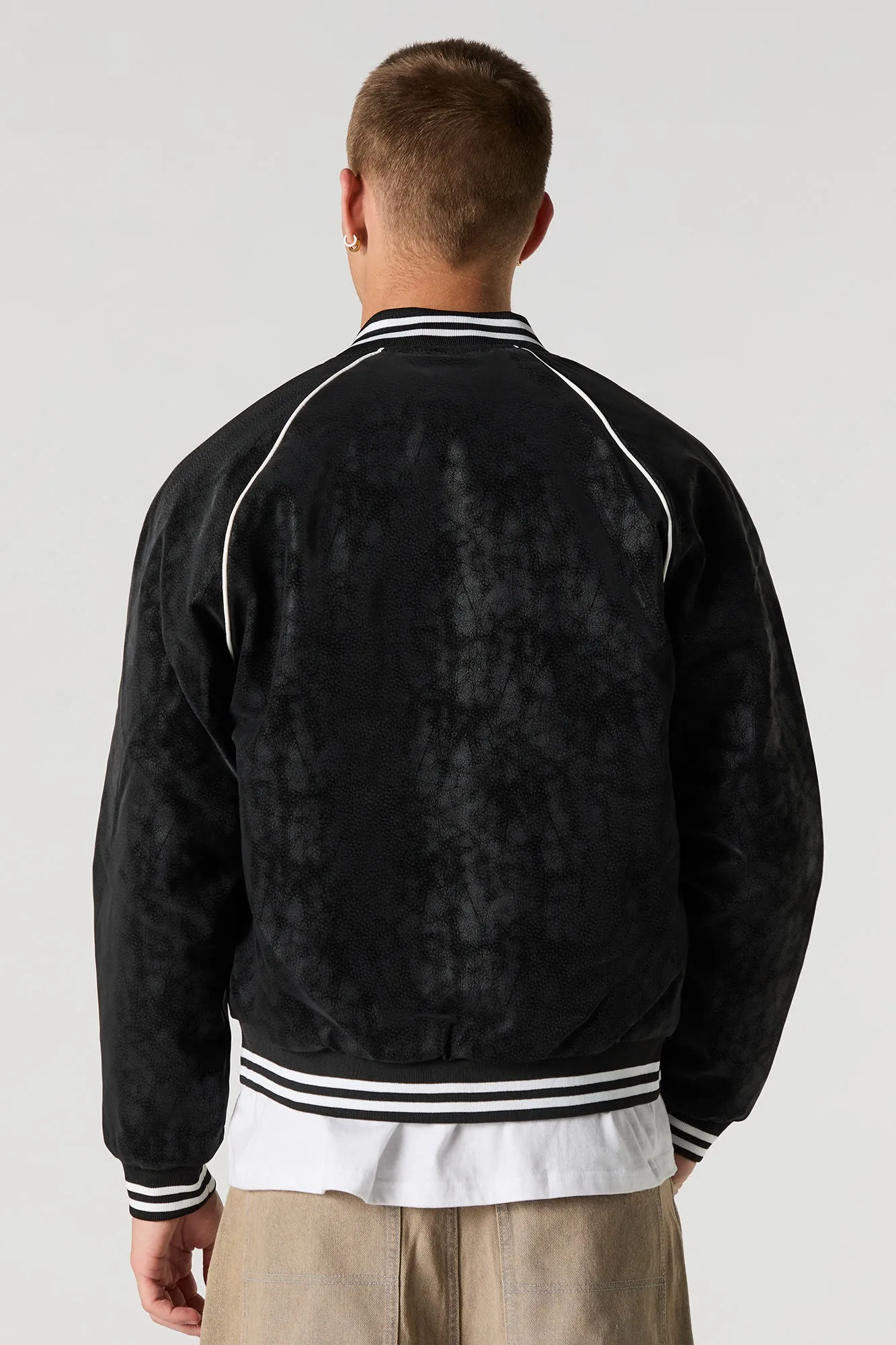 Blouson de style universitaire en similisuède